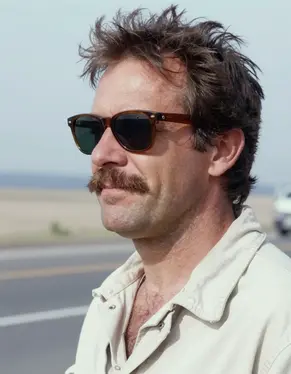 El Jefe Caliente, in profile with sunglasses